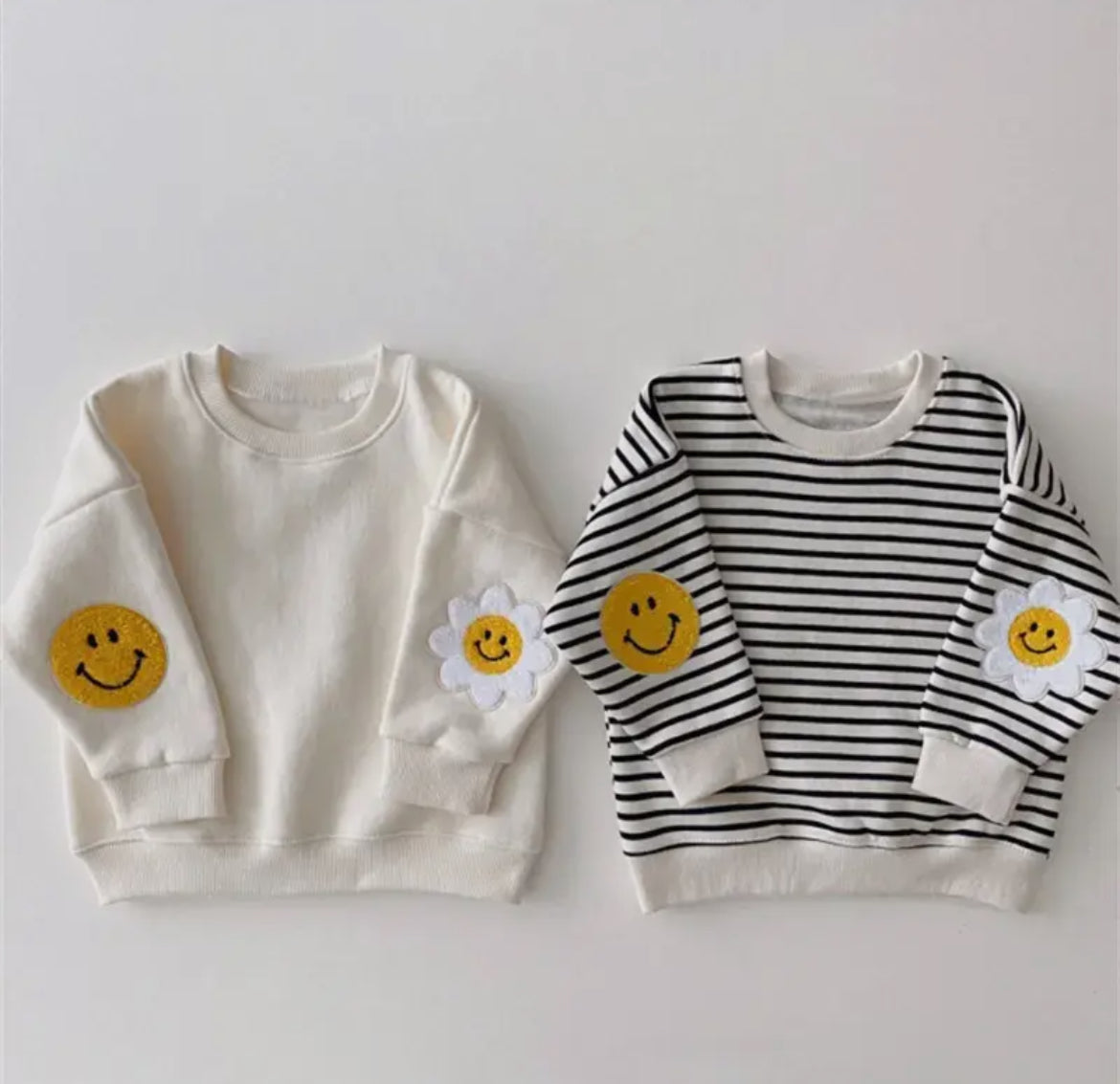 Daisy Patch Striped Sweatshirt.